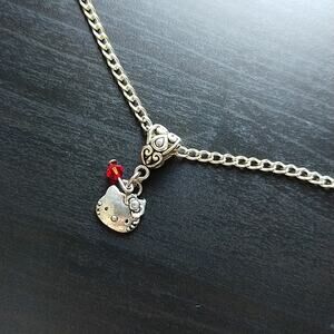 Anklet, Hello Kitty Silver tube bail red bead 12" NOS fashion jewelry Sanrio Y2K